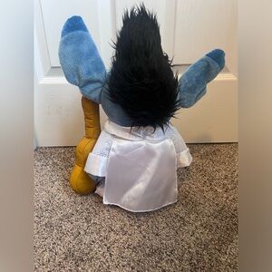 Brand new super cute elvis stitch plush with guitar and stands up on its own.